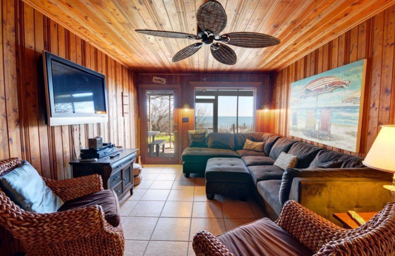 Vacation rental living room at Century 21 Action Inc.
