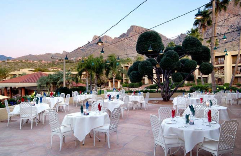 Outdoor dining on the patio at Hilton Tucson El Conquistador Golf & Tennis Resort.