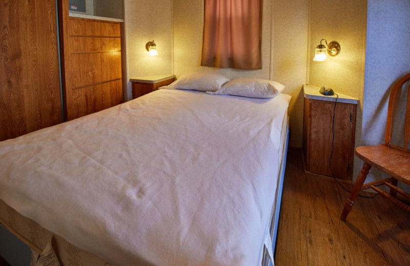 Cottage bedroom at Yogi Bear's Jellystone Park Warrens.