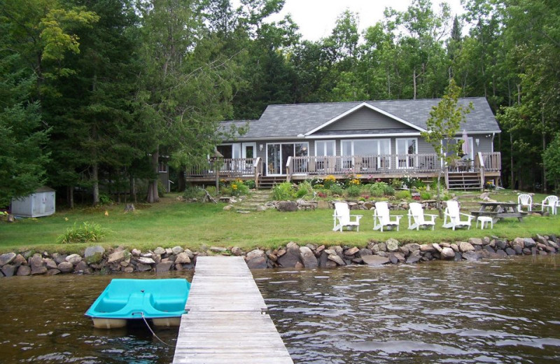 Haliburton Cottage exterior with dock and shoreline.