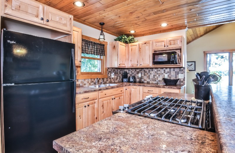 Cabin kitchen at Serenity Bay Resort.
