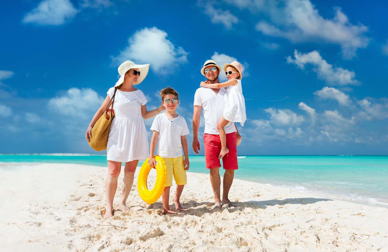 Family on beach near Vacome.