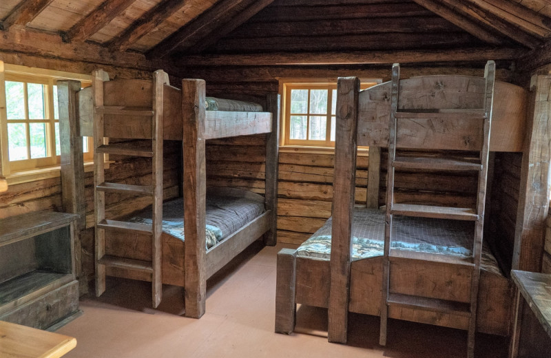 Cabin bedroom at Cliff Lake Resorts.