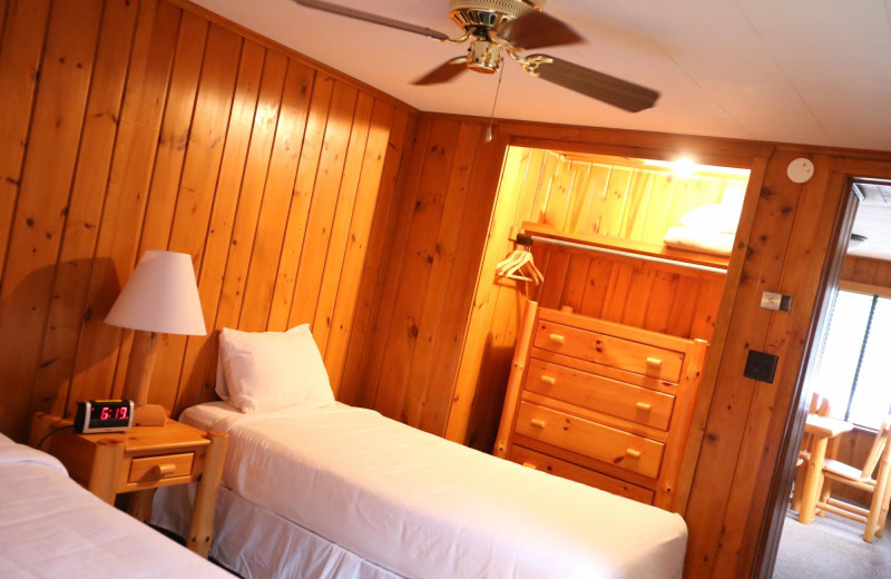 Cabin bedroom at Ruttger's Bay Lake Lodge.