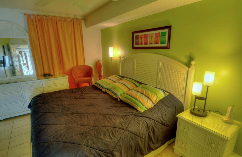 Rental bedroom at CondoLux Vacation Rentals.