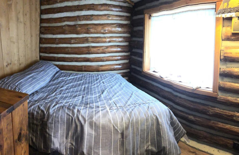 Cabin bedroom at Lake Cabins Resort.