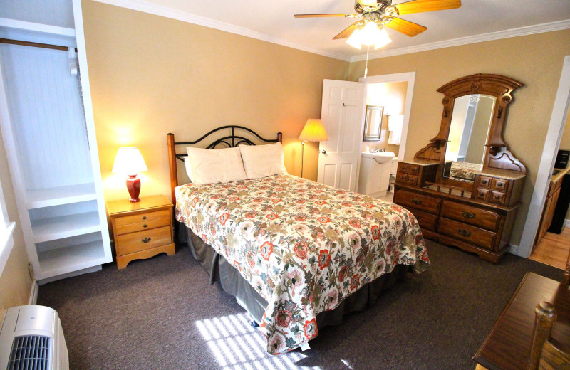 Guest room at Peach Tree Inn & Suites.