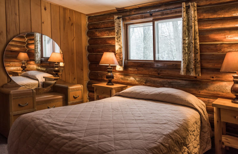 Cabin bedroom at Pitlik's Sand Beach Resort.