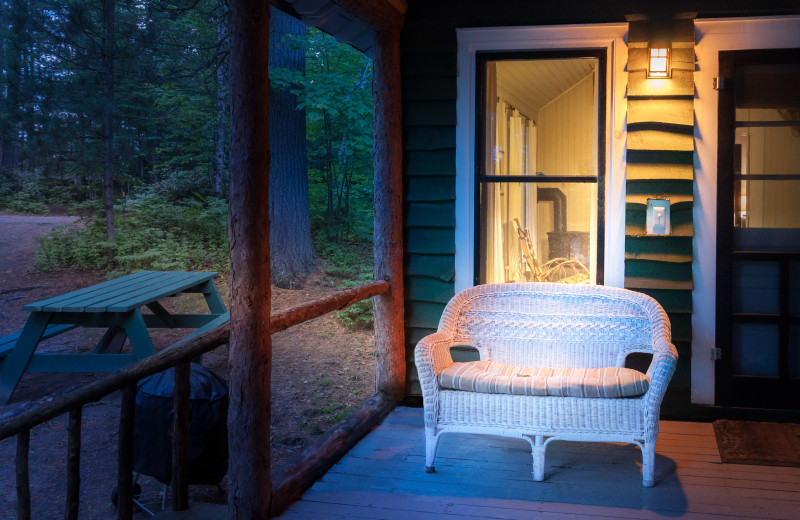 Cabin porch at White Pine Camp.