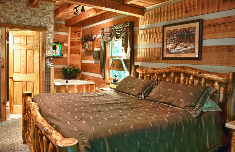 Cabin bedroom at Great Cabins in the Smokies.