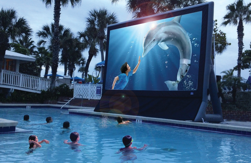 Watching a movie in the pool at TradeWinds Island Grand.