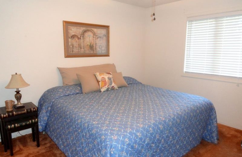 Rental bedroom at Village Villas Vacation Rentals.