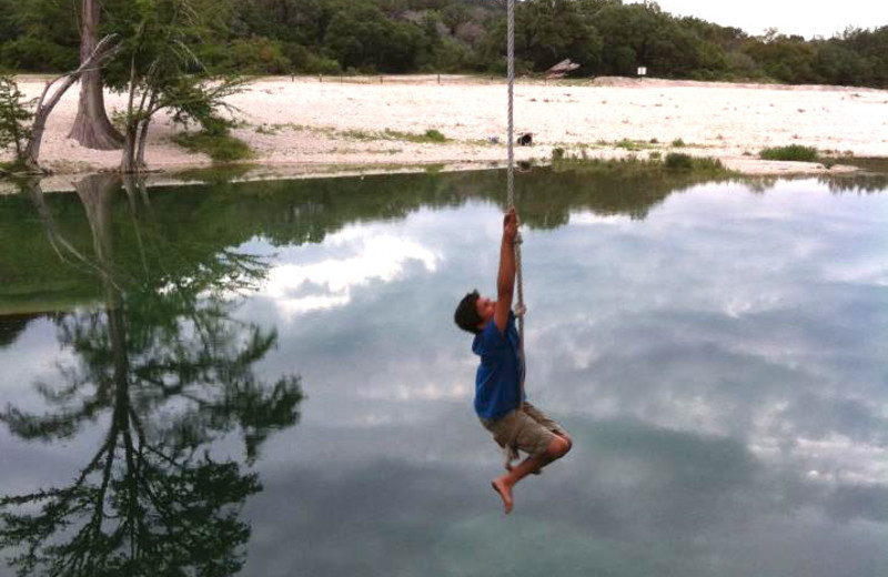 Rope swinging near Neal's Lodges.