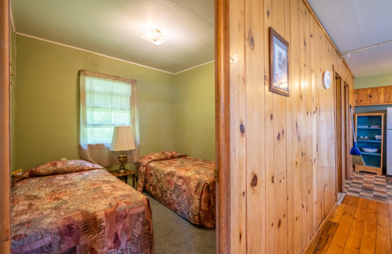 Cabin bedroom at Rising Eagle Resort.