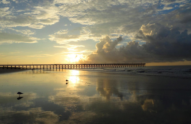 Beach near CondoLux Vacation Rentals.