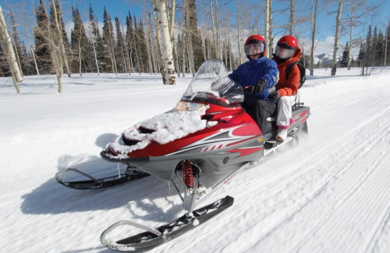 Snowmobiling at Grand Timber Lodge.