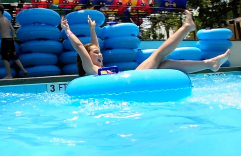 Kid On Tube In Water at Sea Mist Oceanfront Resort