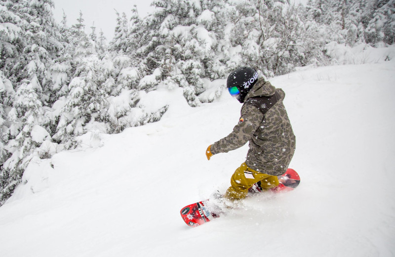 Snowboarding at Mirror Lake Inn Resort & Spa.