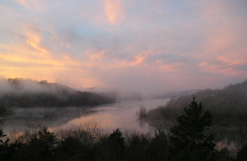 Sunset at Beaver Lakefront Cabins.