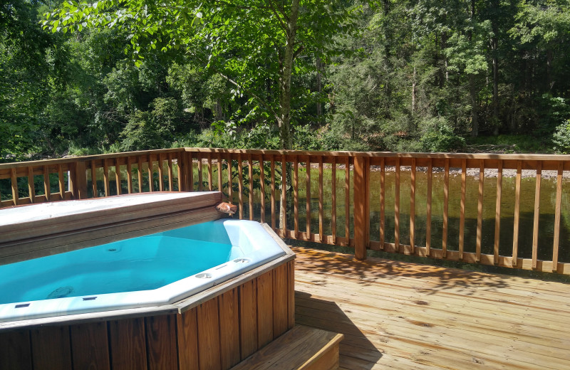 Rental hot tub at Stay Waterfront - Cheat River Lodge & Cabins.