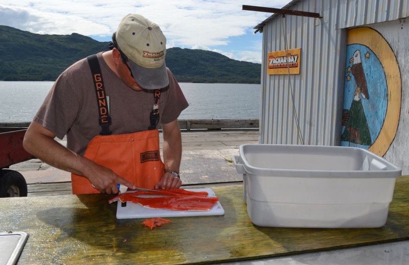 Fish cleaning at Zachar Bay Lodge.