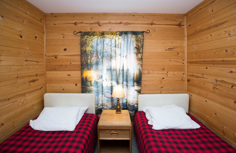 Cabin bedroom at River Bend's Resort & Walleye Inn.