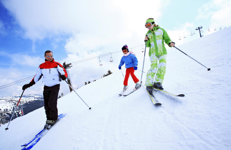 Family skiing at Mammoth Property Reservations.