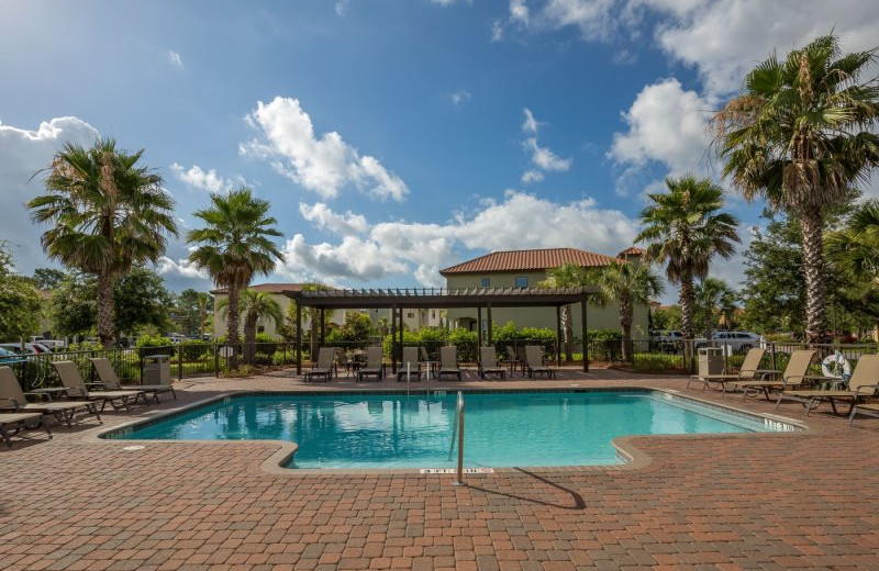 Outdoor pool at Luxury Properties Vacation Rentals.