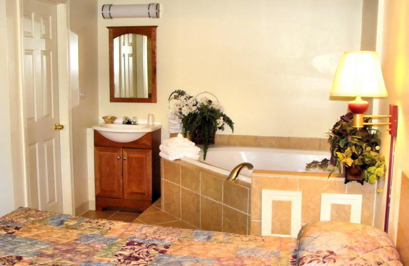 Guest room with jacuzzi at Flagship Inn & Suites.