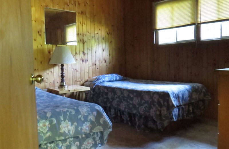 Cabin bedroom at Evergreen Resort.