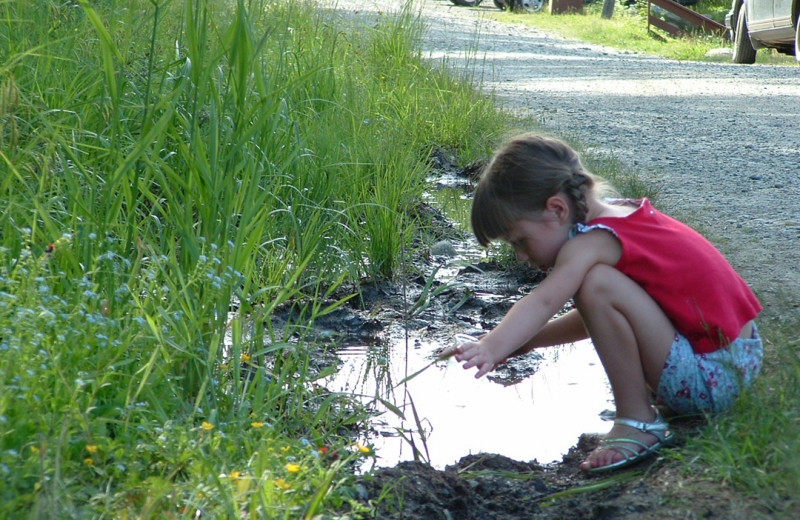 Child observing nature at Grant's Camps.