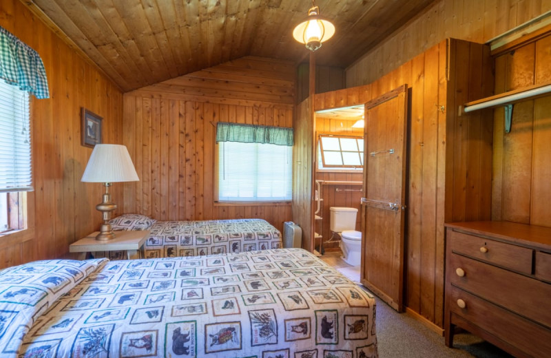 Cabin bedroom at Rising Eagle Resort.