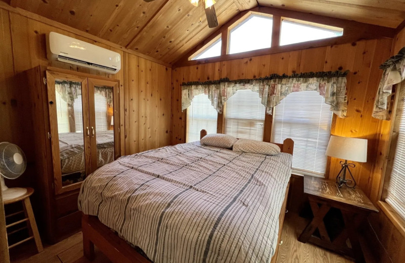 Cabin bedroom at Copper John's Resort.