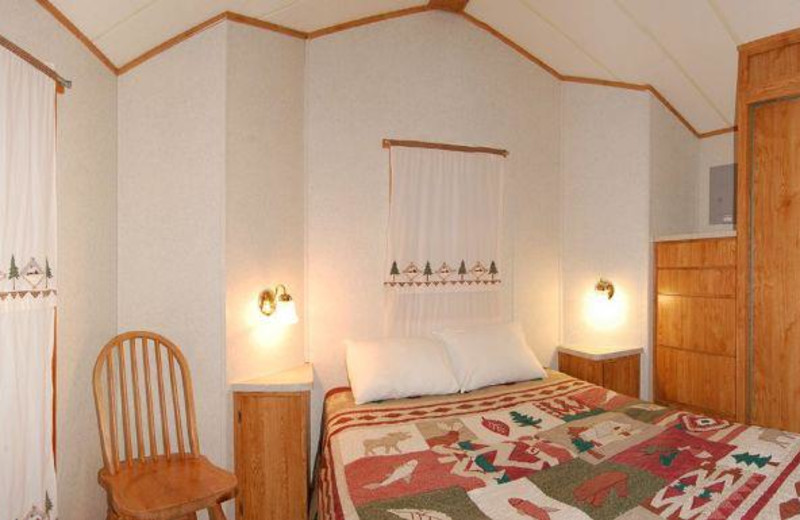 Cabin bedroom at Yogi Bear's Jellystone Park Warrens.