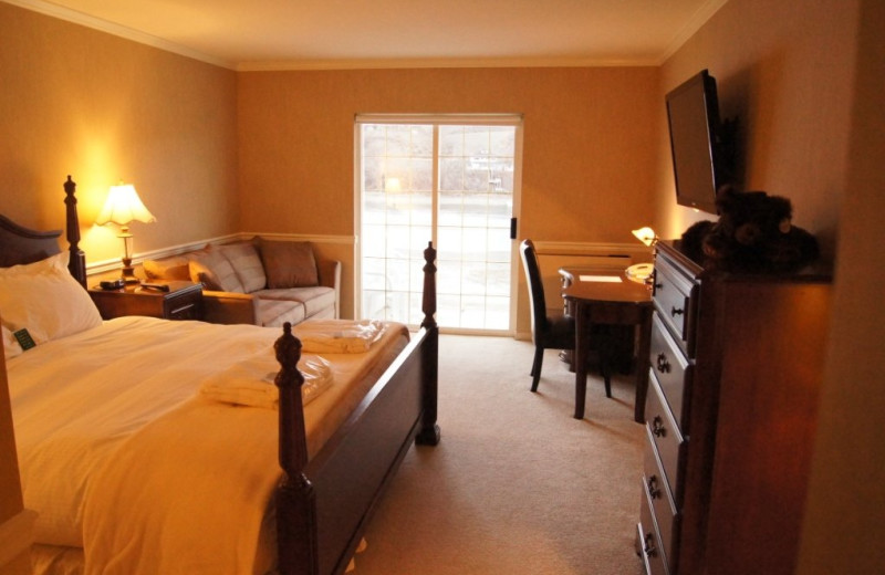 One king bed, pull out sofa bed, work station, river view, 2nd floor at South Thompson Inn & Conference Centre.