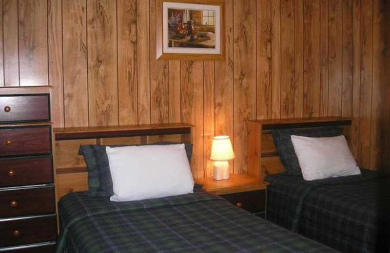 Cabin bedroom at Pleasant Cove Resort.