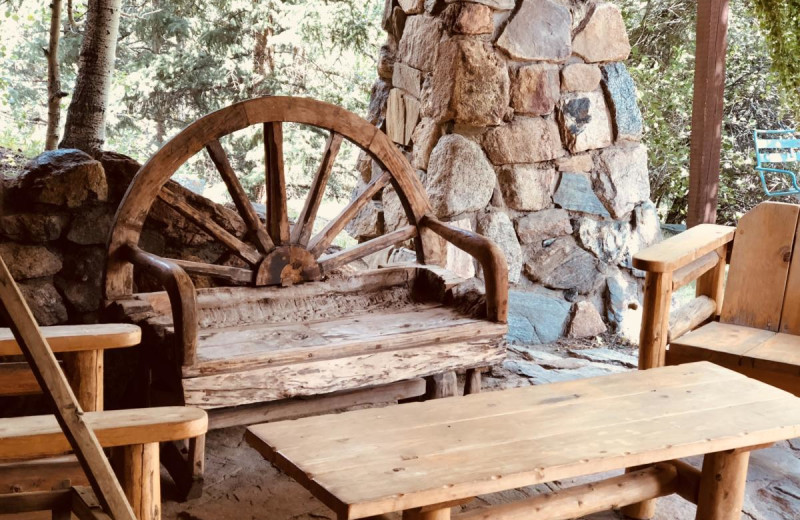 Cabin porch at Tumbling River Ranch.