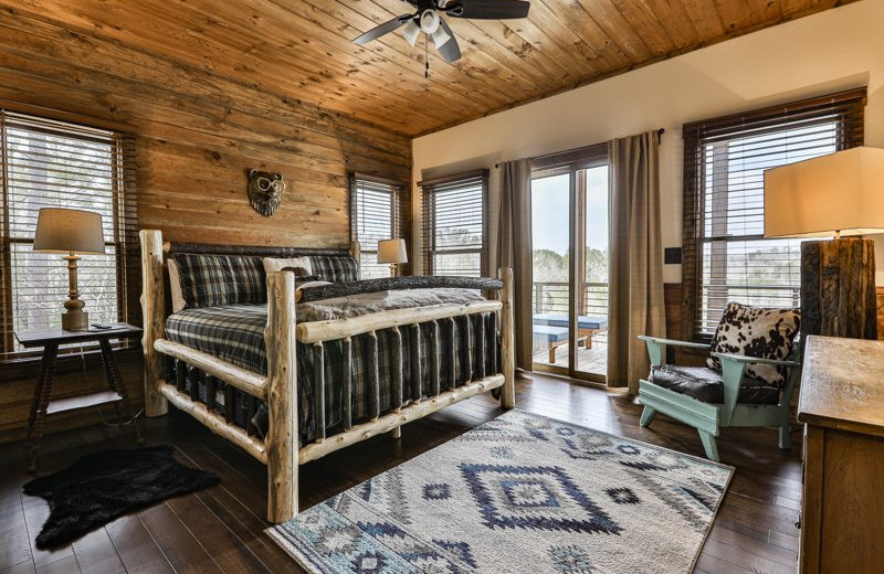 Rental bedroom at Mountain Oasis Cabin Rentals.