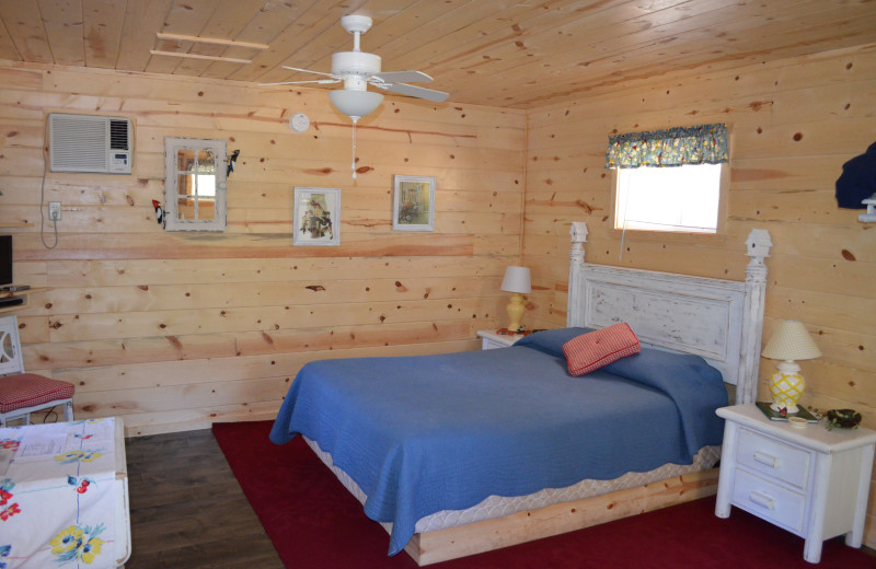 Cabin bedroom at Backroads Inn and Cabins.