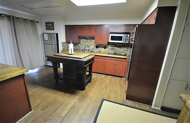 Rental kitchen at Four Seasons Real Estate.