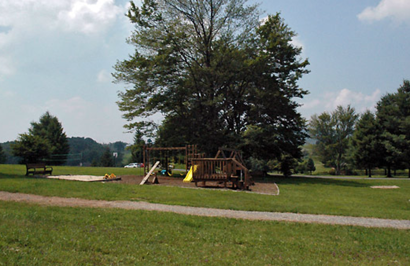 Kid's playground at Black Bear Resort Rentals.