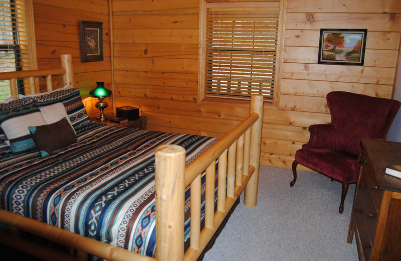 Cabin bedroom at Cabin Fever Resort.