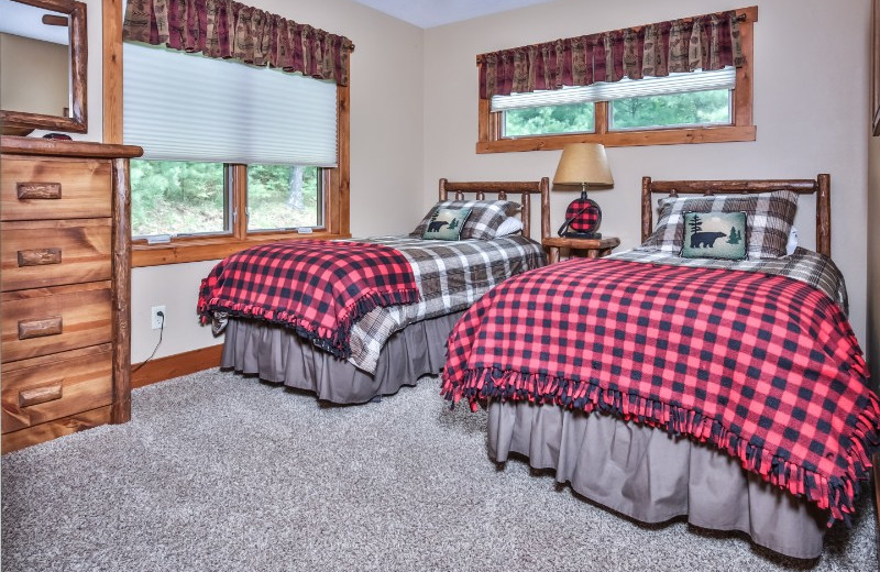 Cabin bedroom at Serenity Bay Resort.