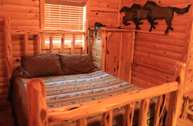 Guest bedroom at Flying L Hill Country Resort & Conference Center.