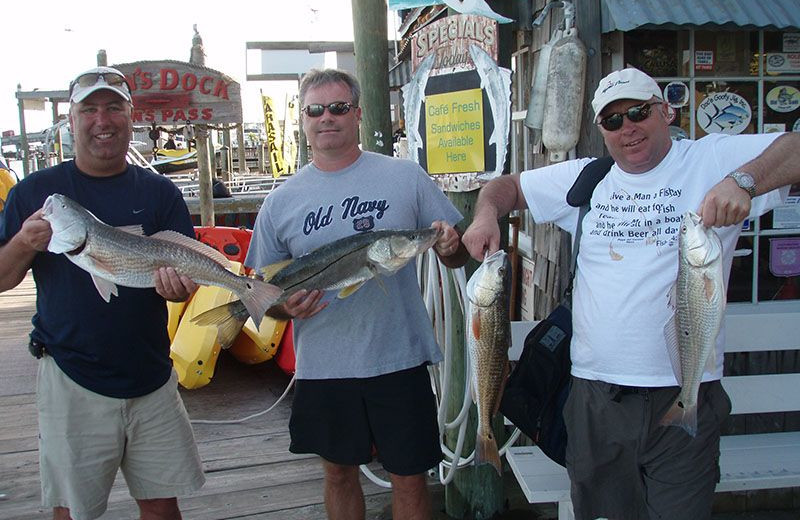 Fishing at Plumlee Gulf Beach Realty.