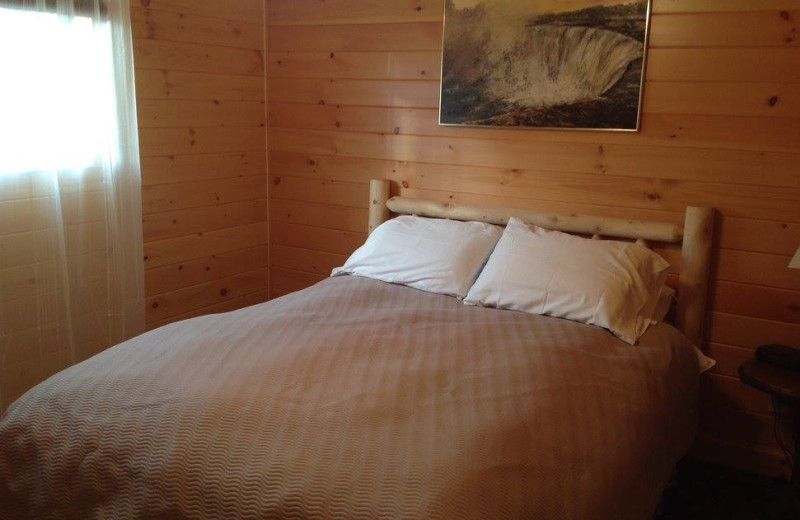 Cabin bedroom at Fernleigh Lodge.