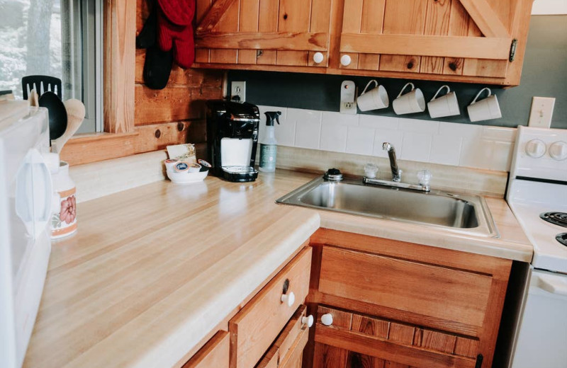 Cabin kitchen at Arkansas White River Cabins.