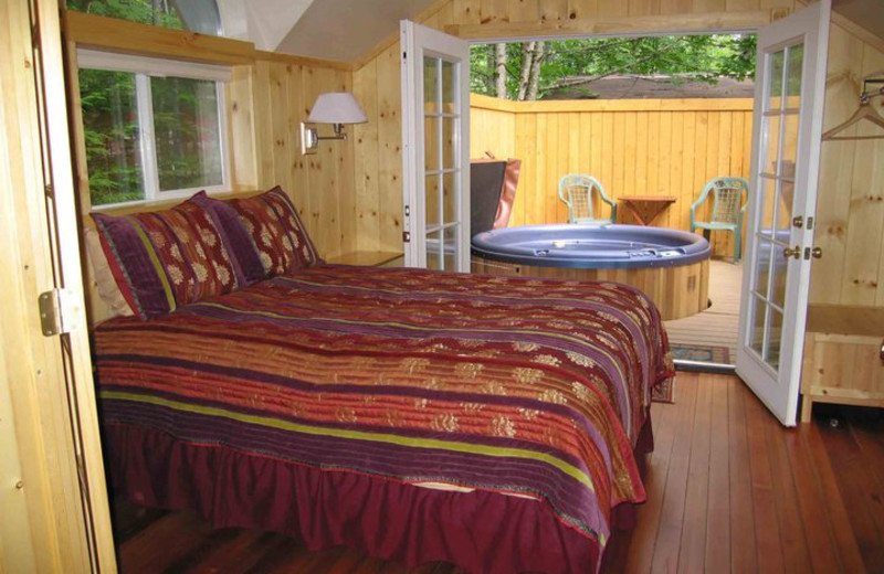 Cabin bedroom at Deep Forest Cabins.