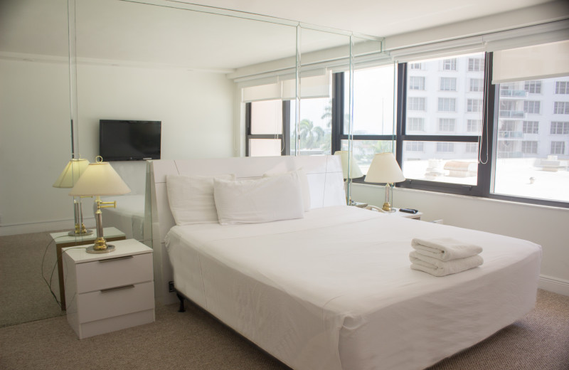 Guest bedroom at The Alexander All Suite Oceanfront Resort.