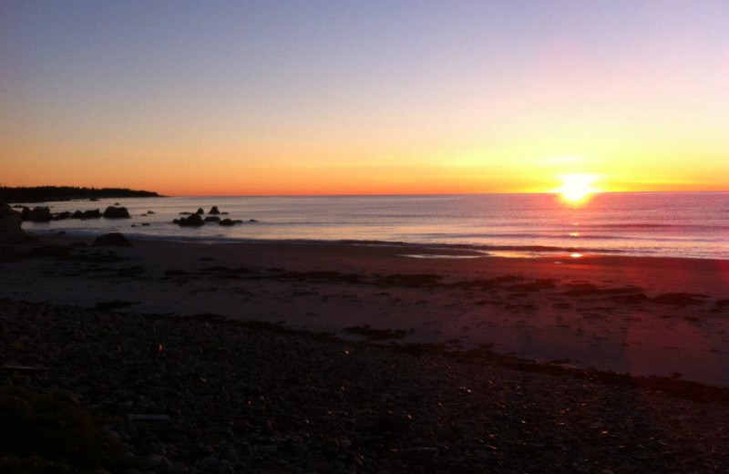 Sunset on the Beach at White Point Beach Resort